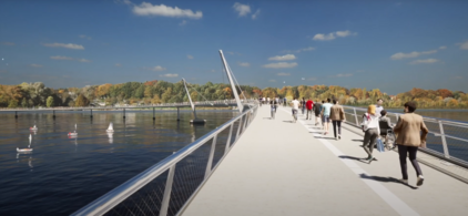 Visualisierung: Menschen gehen auf einer modernen Fußgängerbrücke über die Warnow mit Bäumen im Hintergrund unter blauem Himmel